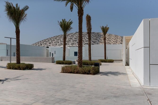 Abu Dhabi Marvelous highlights with Louvre,Grand Mosque & 5<em>lunch – Key points at a glance’ /></p>
<ul>
<li><strong>Twelve Louvre galleries:</strong> Follow a broad story of human creativity, with the building itself often as memorable as the displays.</li>
<li><strong>Sheikh Zayed Grand Mosque inside visit:</strong> See marble work, hand-woven carpets, and large Swarovski chandeliers.</li>
<li><strong>Five-star buffet lunch included:</strong> Soft drinks and water are covered, making the midday break simple.</li>
<li><strong>Emirates Palace photo stop:</strong> Pause at the Breakwater for postcard-style views of the famous hotel.</li>
<li><strong>Dress code matters:</strong> Bring long, loose, non-transparent clothing and a headscarf for women.</li>
<li><strong>Around five hours door to door:</strong> Hotel pickup, air-conditioned transport, and return service are included.</li>
</ul>
<h2>Two Abu Dhabi icons in one well-planned outing</h2>
<p><img width="669" height="446" decoding="async" src=