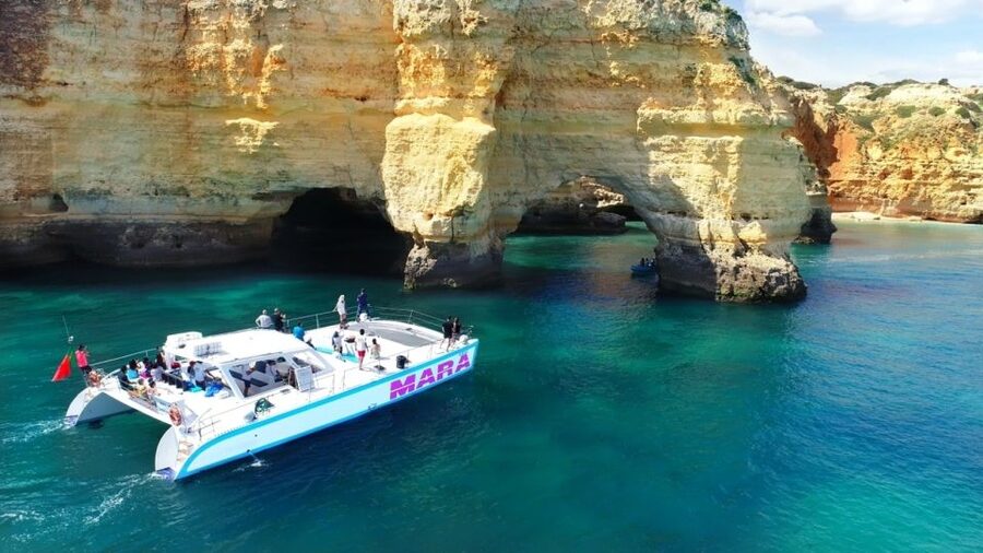 Albufeira: Catamaran Cruise with BBQ & Open Bar on the Beach - Seeing Benagil by catamaran