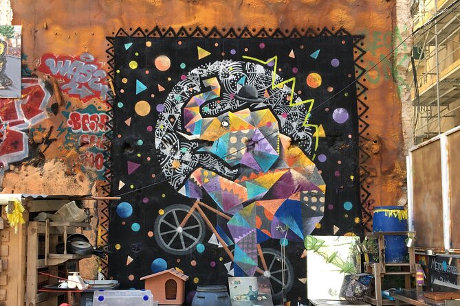 Barcelona Street Art Tour with Exclusive Artist Studios Visit - The Gothic Quarter: medieval stone beside modern marks