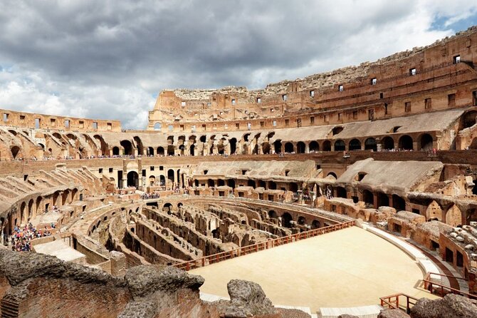 Colosseum: Gladiator’s Gate and Arena Floor Experience - Walking through the Roman Forum in 55 minutes