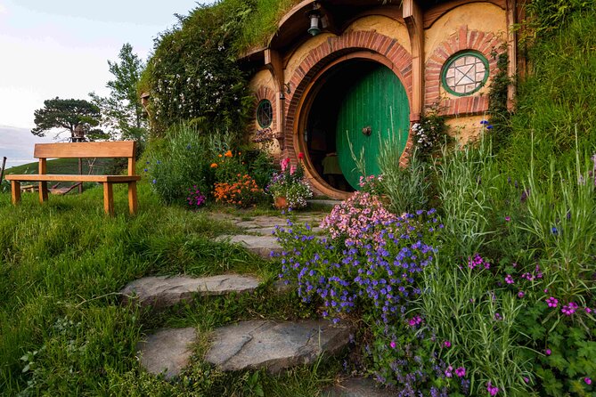 From Auckland:Hobbiton Movie Set & Waitomo Caves Small Group Tour - Waitomo Glowworm Caves and the boat beneath the lights