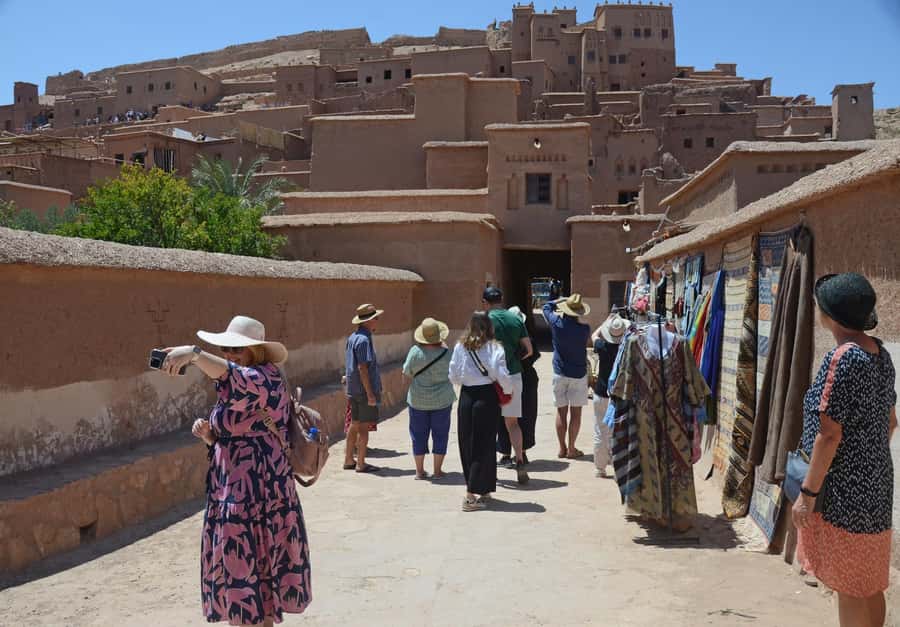 From Ouarzazate: Aït Benhaddu, Fint Oasis & Film Studio Trip - Fint Oasis beyond the dry hills