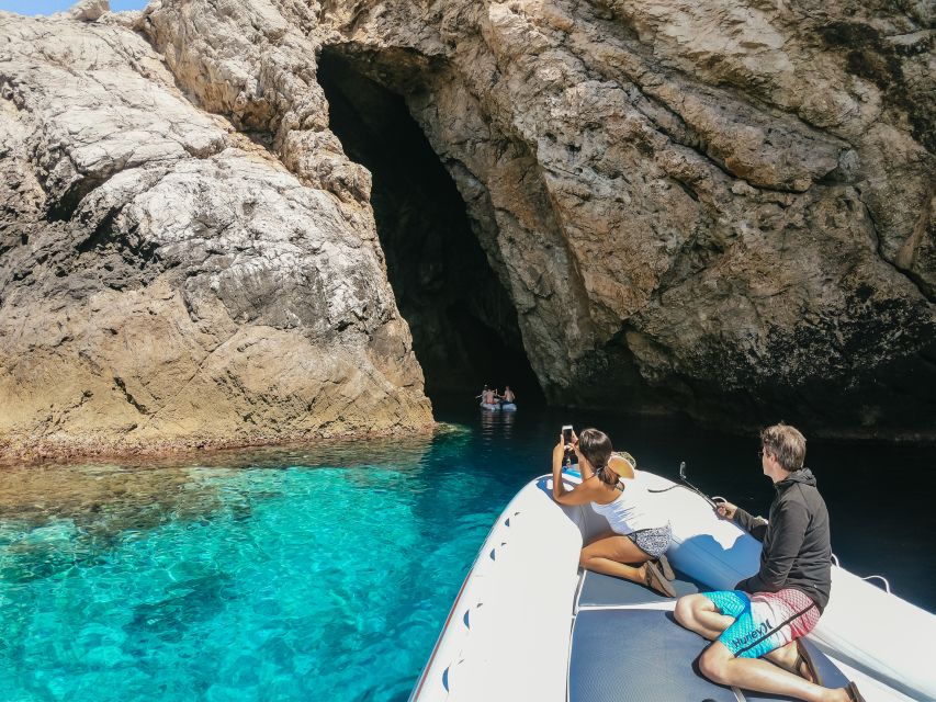 From Split: Blue Cave, Mamma Mia, Vis & Hvar 5-Island Tour - Stiniva Cove: a dramatic beach from the water