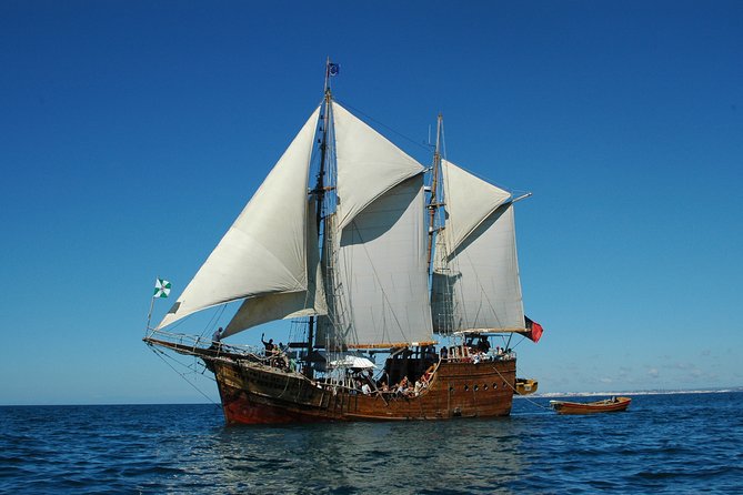 Full day trip with BBQ on the beach, Caves, Sailing - Entering Benagil Cave by traditional boat