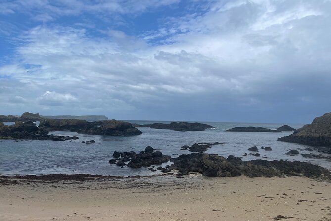 Game Of Thrones Locations & Giants Causeway North Antrim Coast Tour - Cushendun Caves show the coast at its rawest