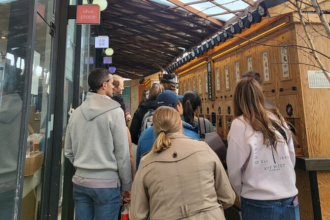 Gwangjang market Netflix Food Walking Tour with Insadong - The included food, from fish cake to rice wine