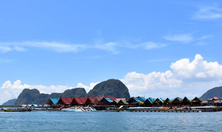 James Bond Island: Sightseeing Tour by Longtail Boat & Kayak - Crossing the bay by traditional longtail boat