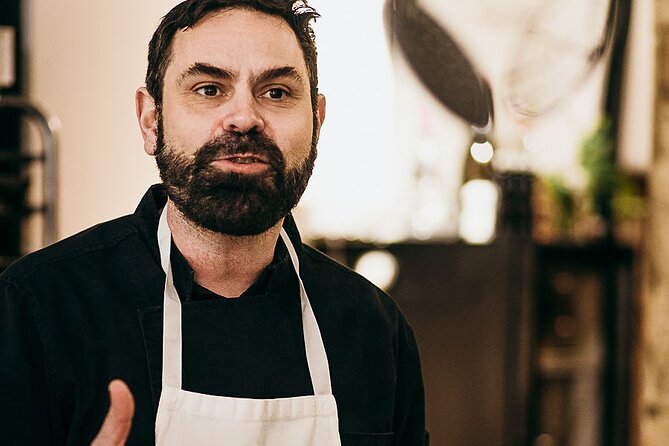 Market Tour, Cooking Class & Lunch with Chef in Lyon Studio - Learning to break down a chicken