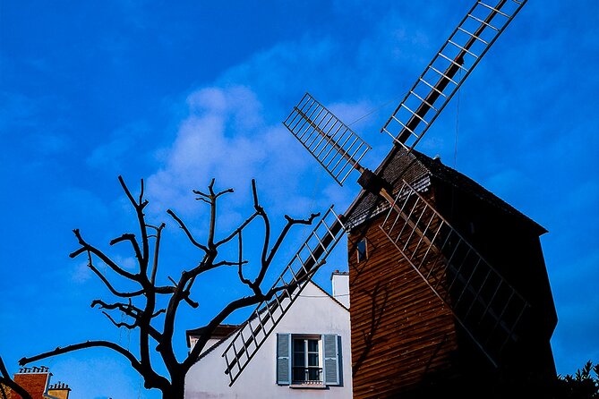 Montmartre Marvels Small Group Guided Stroll in Bohemian Paris - The vineyard, Au Lapin Agile, and unusual local stories