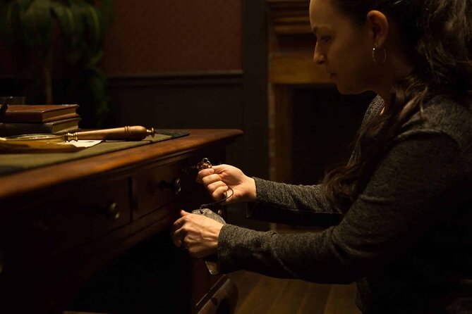 Sherlock Studies 75-Minute Escape Room - Searching for clues and secret passages