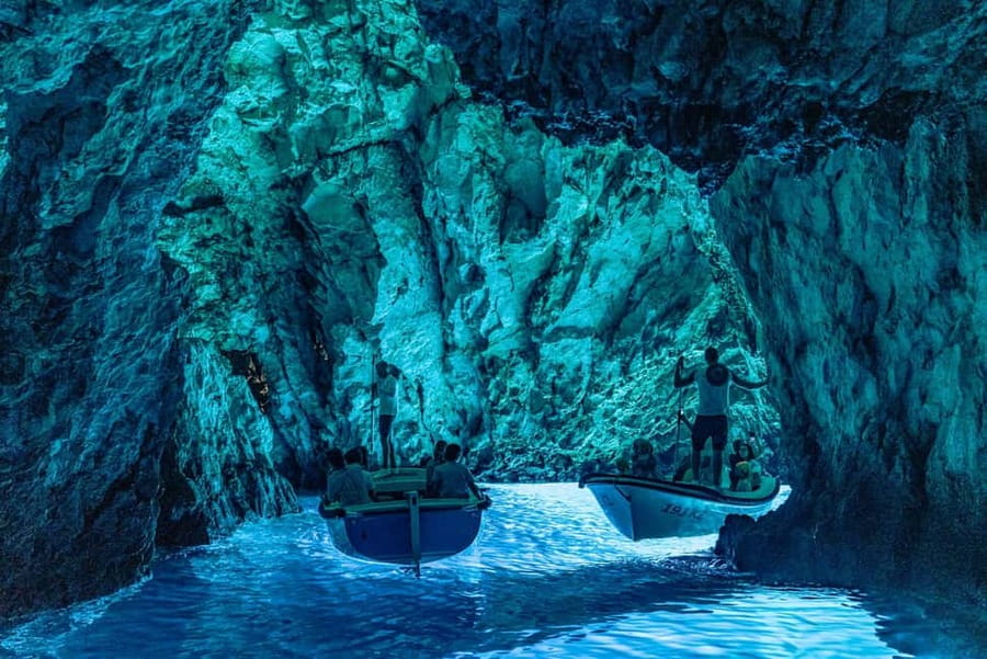 Split/Trogir: Blue Cave, Mamma Mia, Hvar and 5 Island Tour - Entering Biševo’s glowing Blue Cave