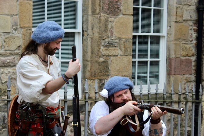 The History Behind Outlander Tour - The guide, clothing, and weapons display